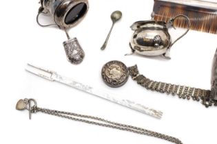 A group of silver items