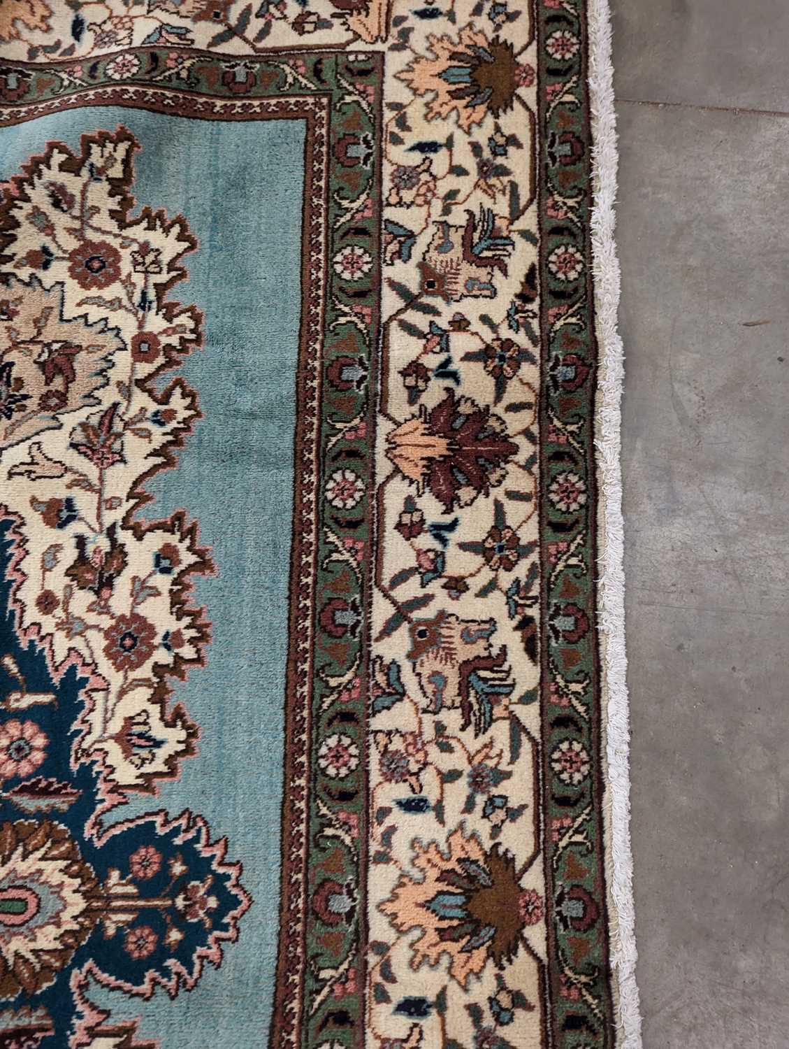 A Tabriz carpet - Image 12 of 25