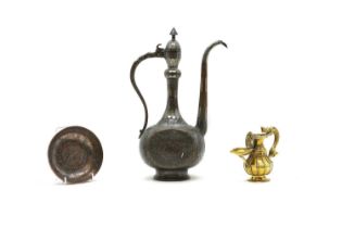 An Islamic copper coffee pot