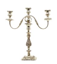 A silver plated three branch candelabra