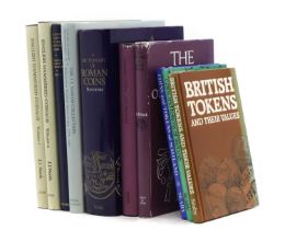 A collection of coinage books,