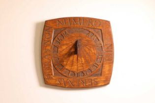 An Arts and Crafts oak sundial,