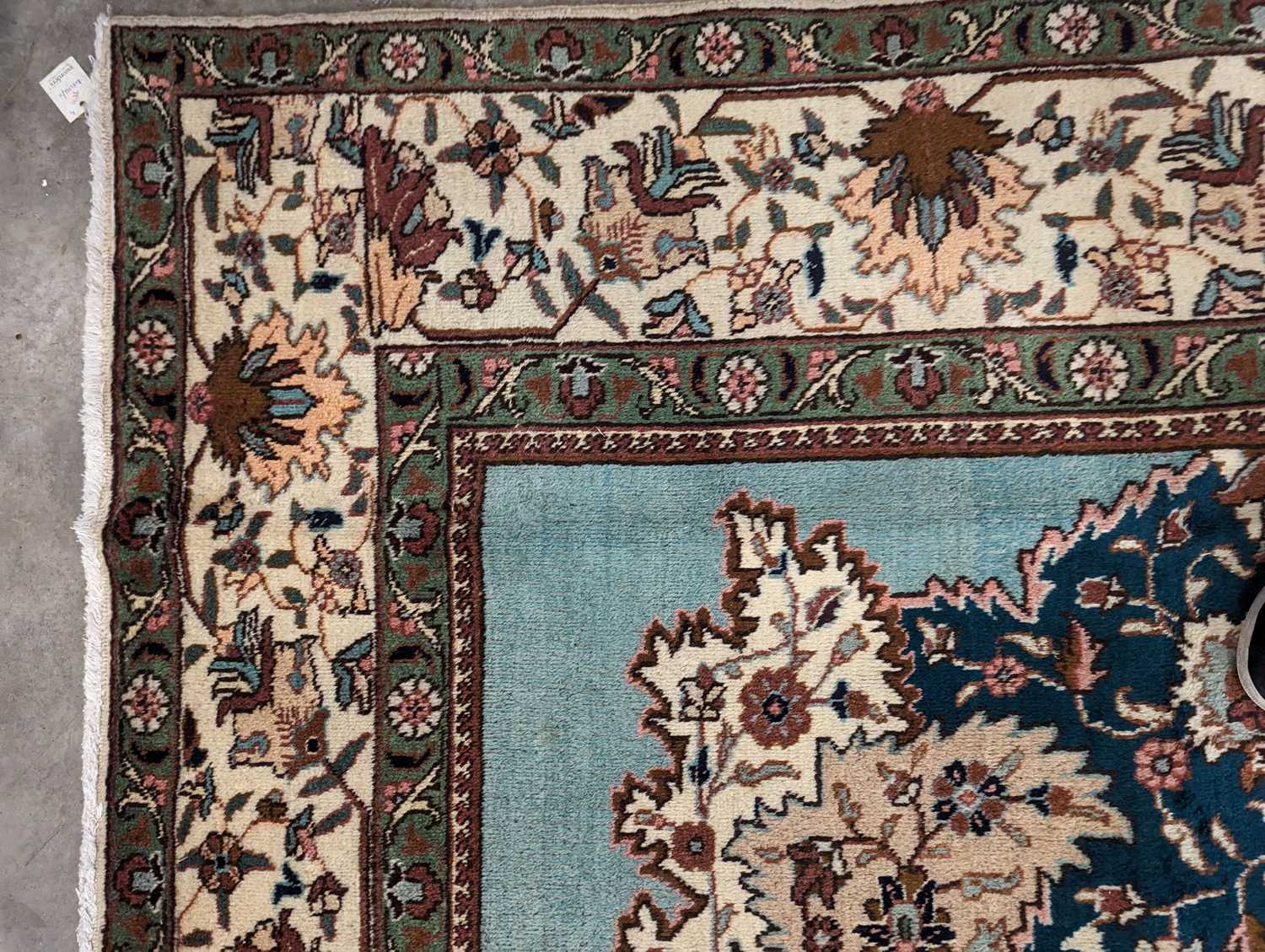 A Tabriz carpet - Image 11 of 25