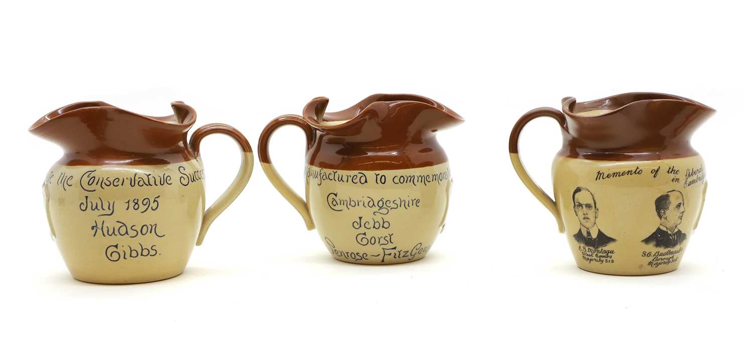 A set of three Denby commemorative stoneware jugs,