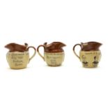 A set of three Denby commemorative stoneware jugs,