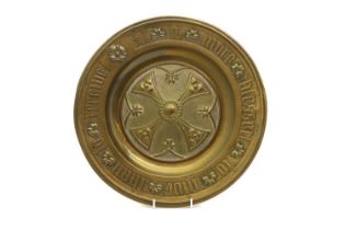 An ecclesiastical brass dish,