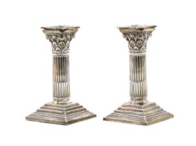 A pair of Mappin & Webb candlesticks