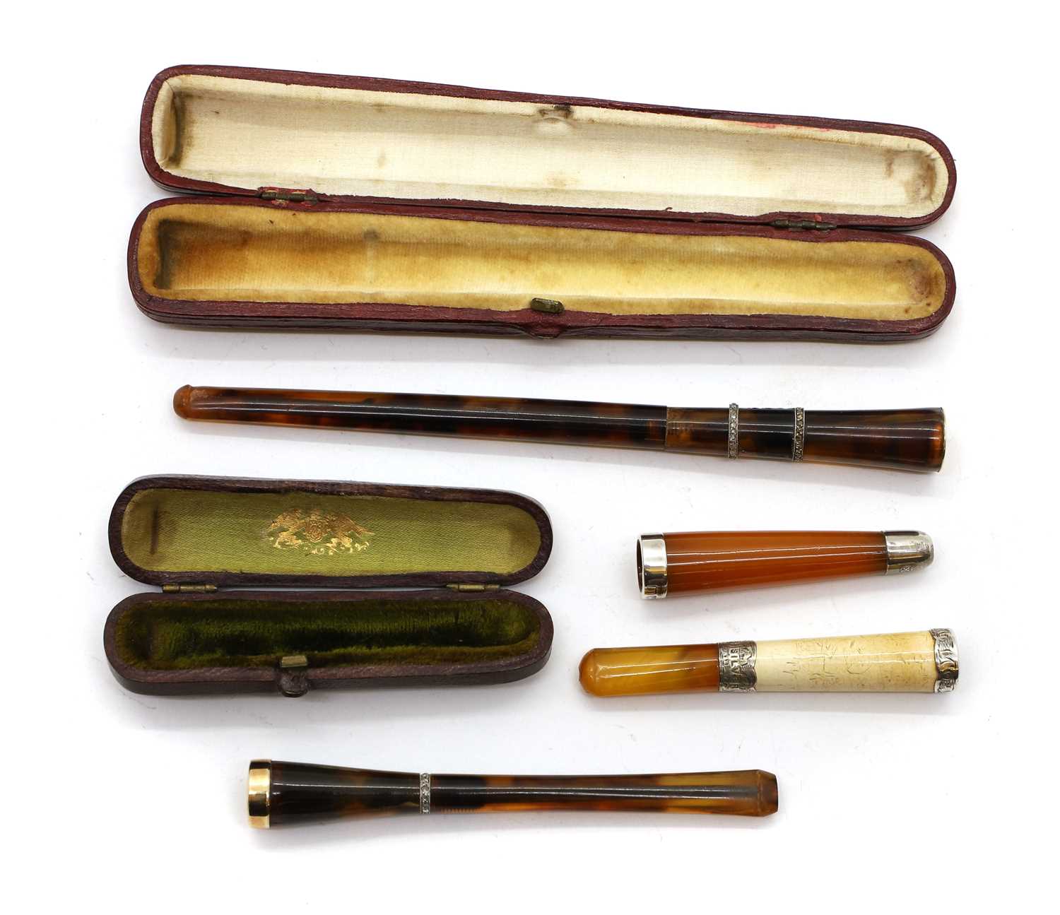 Two tortoiseshell and diamond inlaid cigarette holders,