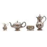 A Victorian four piece silver tea service
