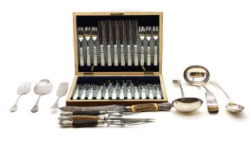 A four piece horn and silver mounted carving set