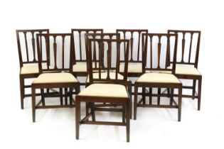 A set of eight Sheraton mahogany dining chairs