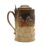 A salt glazed flagon or tankard,