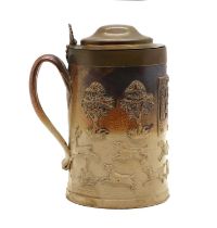 A salt glazed flagon or tankard,