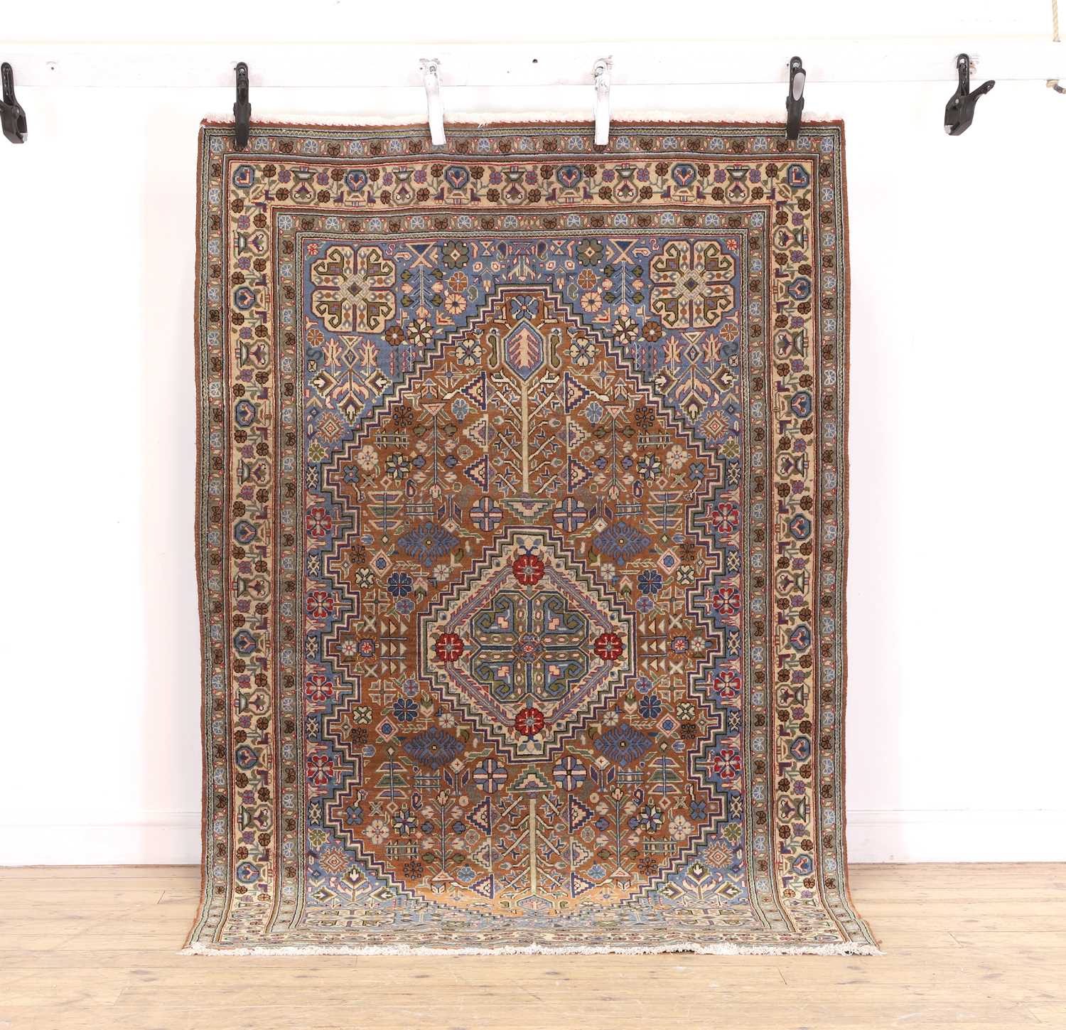 A Tabriz rug