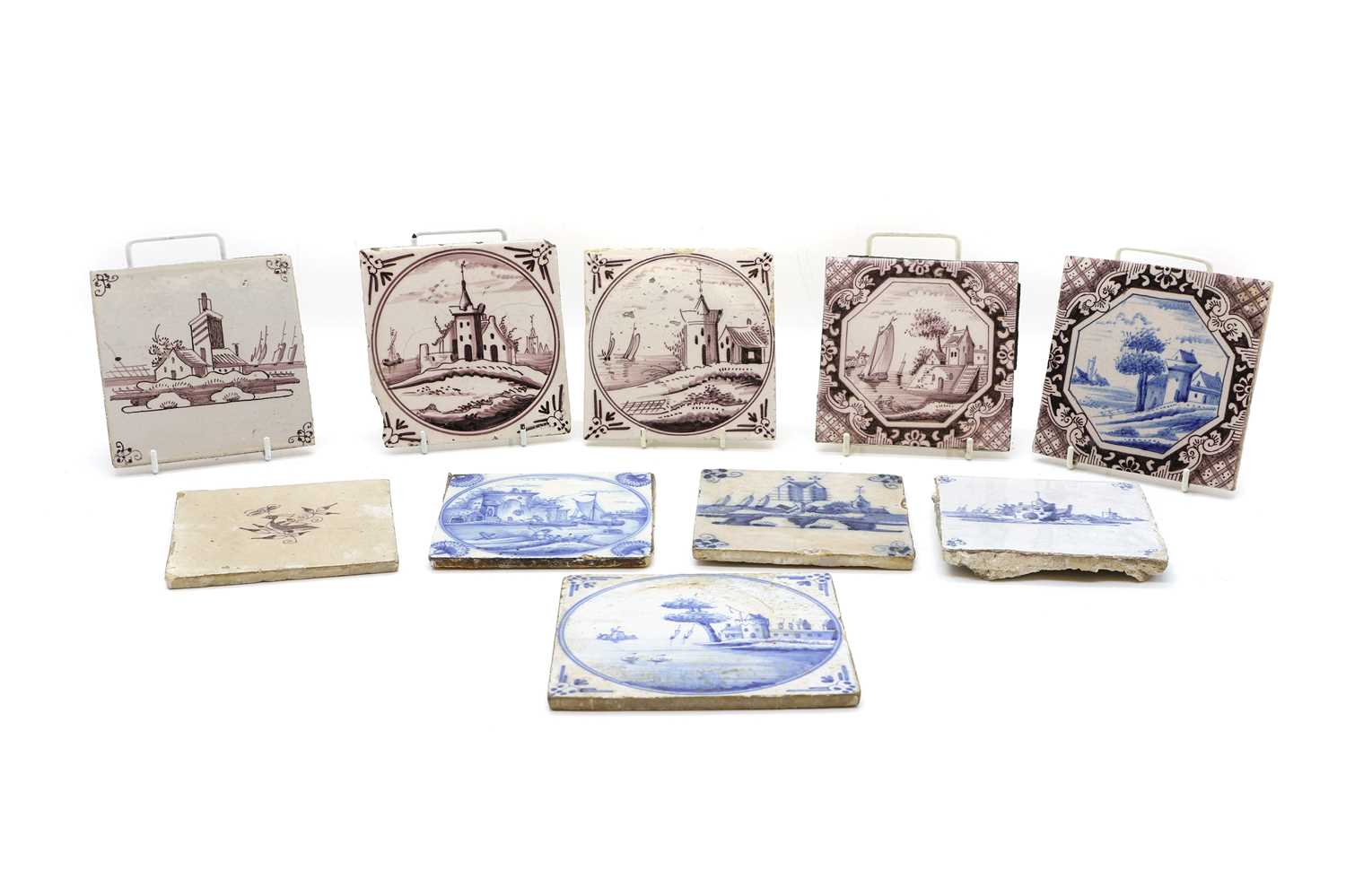 A group of six Delft pottery manganese tiles,