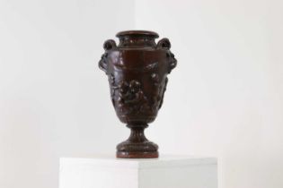 A bronzed calamine urn,