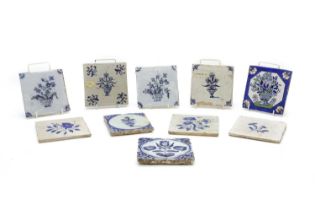 A group of ten Delft blue and white pottery tiles,