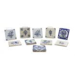 A group of ten Delft blue and white pottery tiles,