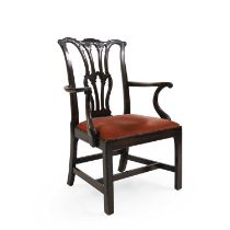 A carved mahogany elbow chair,