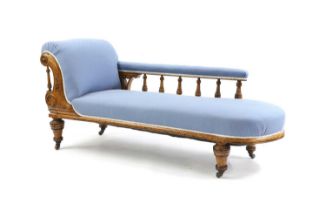 An oak chaise longue,