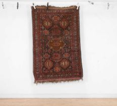 An Afghan wool rug,