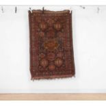 An Afghan wool rug,