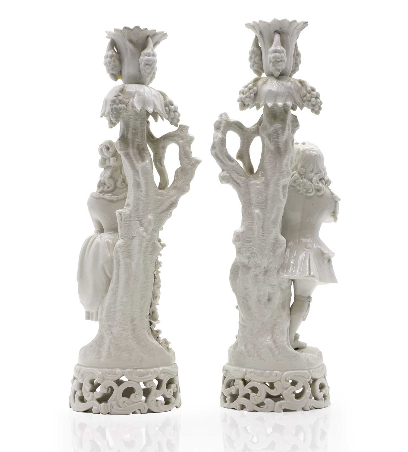 A pair of Dresden 'blanc de chine' figural candlesticks, - Image 2 of 22