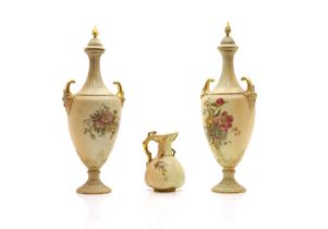 A pair of Royal Worcester porcelain vases