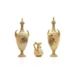 A pair of Royal Worcester porcelain vases