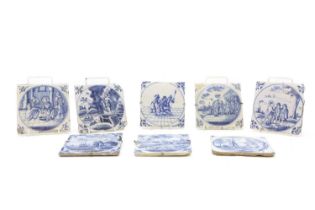 A group of eight Delft pottery blue and white tiles,
