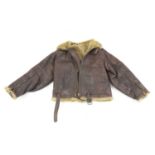A WWII Irvin pattern sheep skin and fleece lined leather flying jacket