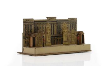 A tin-plate clock work model of Buckingham palace