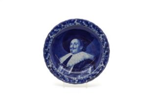 A Delft pottery blue and white charger,