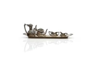 A silver novelty miniature tea service,