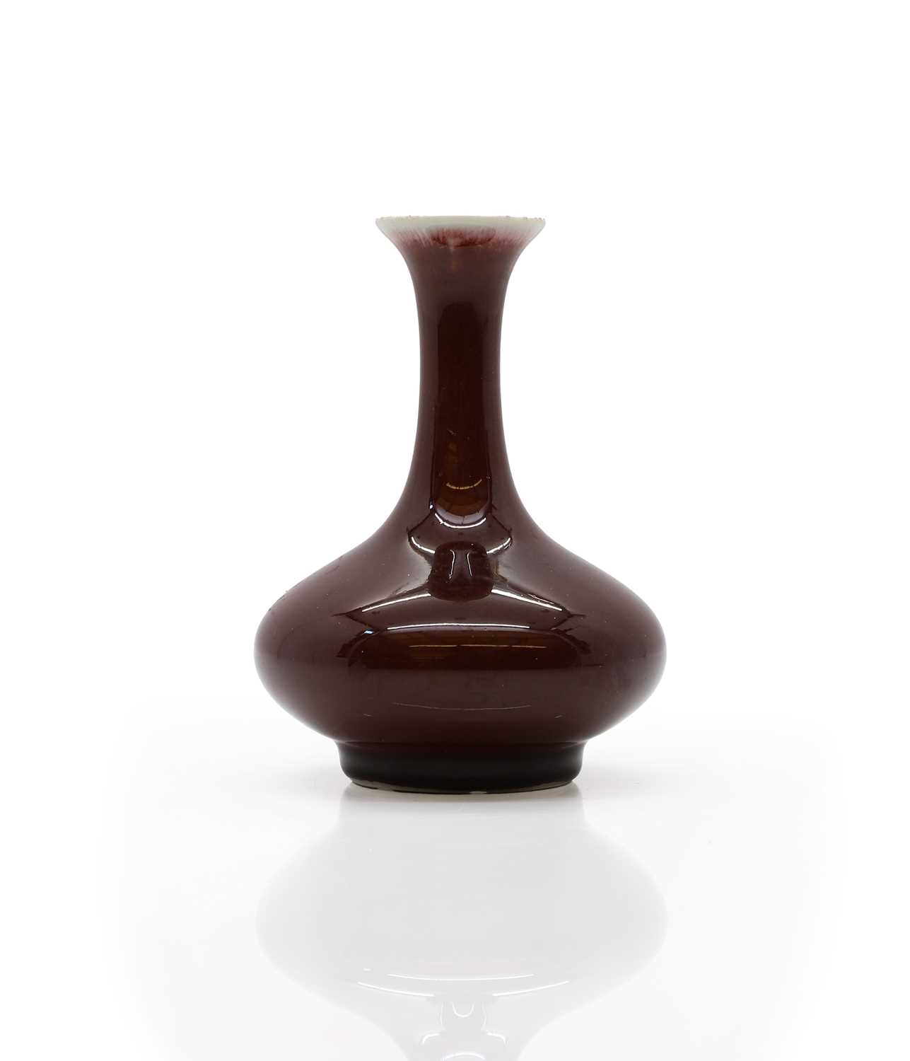 A Sang de beouf glazed vase,