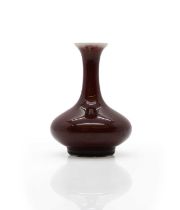 A Sang de beouf glazed vase,