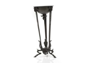 A tripod oil lamp