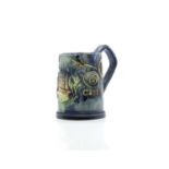 A Castle Hedingham pottery 'Castle' mug,