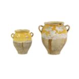 A near pair of earthenware confit pots,