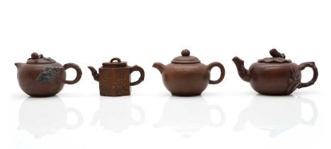 A collection of four Chinese Yixing stoneware teapots,