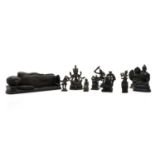 A group of nine bronze buddha and other deities,