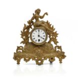 A gilt metal mantle clock,