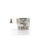 A silver repousse mug,