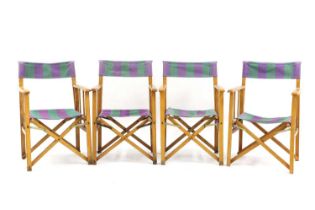 A set of four Wimbledon beech director's chairs,