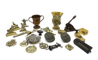 A collection of brassware,