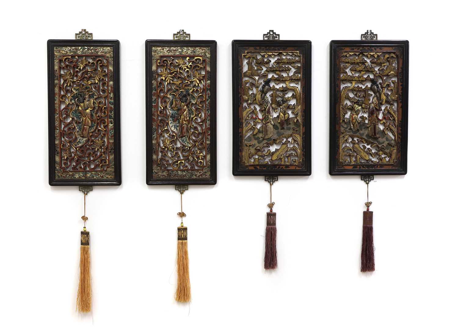 Two pairs of Chinese gilt lacquered wood panels,