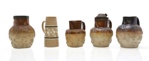 A group of four salt glazed stoneware 'Harvest' jugs,