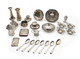 A group of silver items