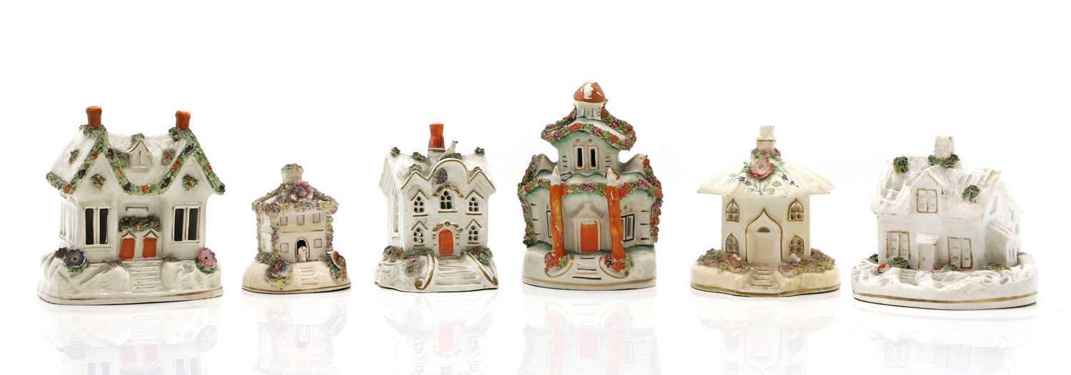 A group of six Staffordshire 'Cottage' pastille burners,