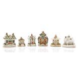 A group of six Staffordshire 'Cottage' pastille burners,